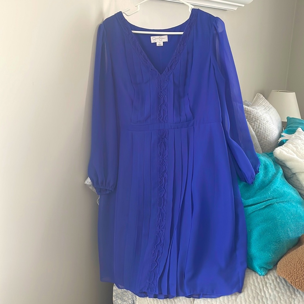 Long-sleeved (but sheer!) bright purple mini dress!